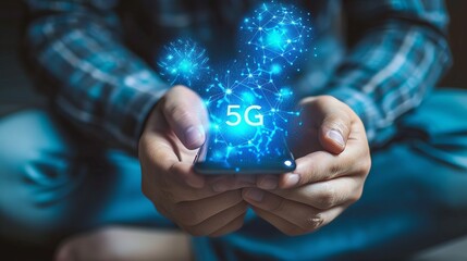 Interactive holographic 5g text icon shining over mobile phone with copy space for text placement