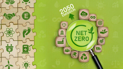 net zero and carbon neutral The green net zero icon on the Jigsaw and the net zero symbol on the...