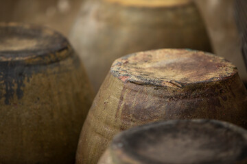 Close up shot of old  jugs. Shallow depth of field