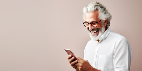 Happy senior man using his phone - Powered by Adobe