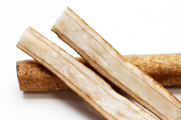 Burdock Root (Gobo) on white background.