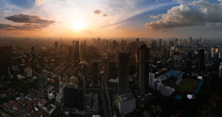 Fototapeta premium Beautiful sunset in Jakarta City Indonesia. Jakarta, is a capital city of indonesia that become the centre of economic and financial of Indonesia.