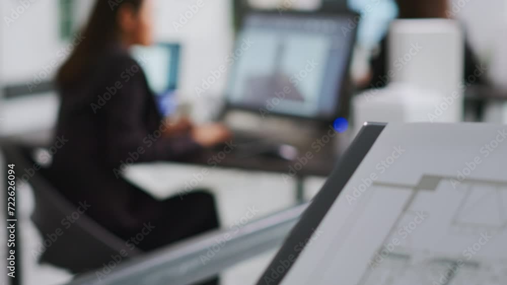 Poster architect working on building design with graphic software to create layout sketch for architecture 