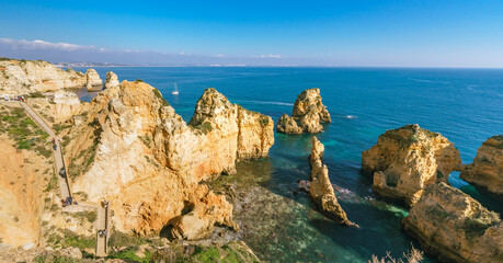 Lagos golden sand beaches nestled between sandstone cliffs. Algarve, Portugal