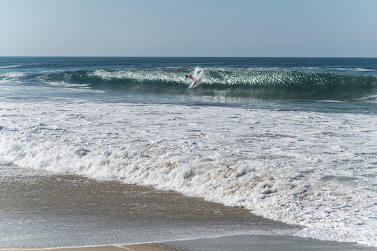 Surfer wipe out in Zicatela beach, Oaxaca, Mexico