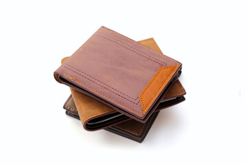 Brown wallets on white background.
