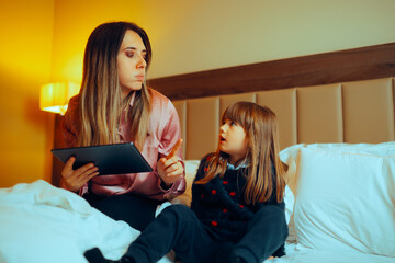 Mom Saying No More Screen Time to her Little Daughter. Strict mother limiting the screen-time...