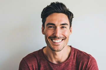 Portrait of handsome man smiling at camera against white background,  Man looking at camera