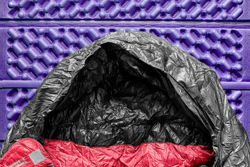 Sleeping bag on sleeping pad.