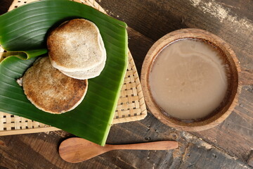 Serabi Surabi Kocor is traditional Javanese snack made of rice flour, coconut milk, pandanus...