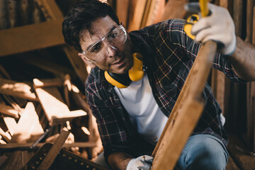 professional carpenter man hand working make wooden handcraft furniture master workpiece fine detail artisan with wood workshop.