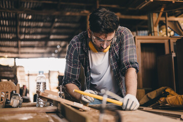 professional carpenter man hand working make wooden handcraft furniture master workpiece fine detail artisan with wood workshop.