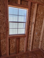 window in uninsulated storage shed