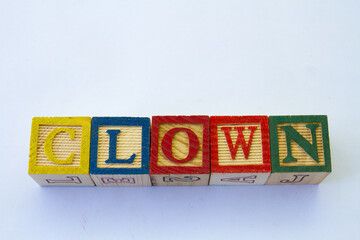 The term clown displayed visually on a clear background with copy space