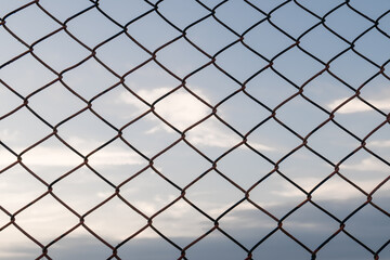 chain link fence with sky