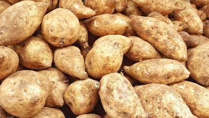 Sweet potatoes background. Sold in Indonesian local market.