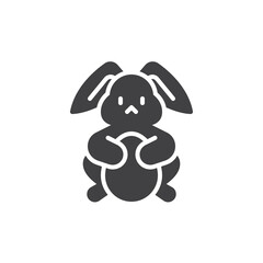 Bunny holding an Easter egg vector icon