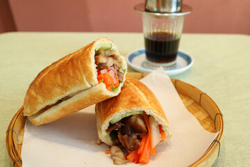 Mouthwatering Banh Mi with Vietnamese Drip Coffee in the Backdrop