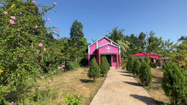Pan right panoramic view of Presbyterian Church in Lawachara forest village, Bangladesh.