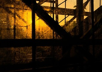 Abstract image of metal structures of a building during the sunset