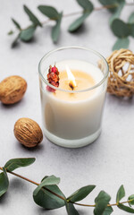 Aromatic candle on the table.