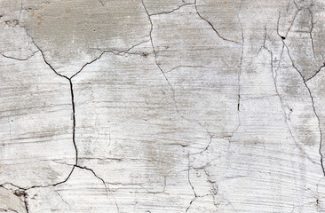 Obraz premium Cracked concrete as an abstract background. Texture