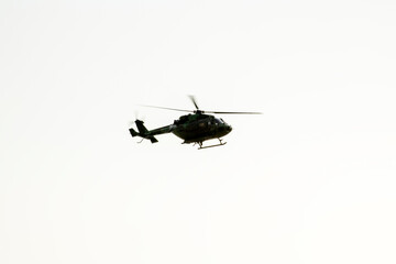 helicopter is flying on isolated white background