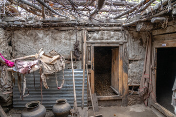 Pictures from Balti Heritage home and Museum, display the village home, century-old utensils, horse saddle, and vibrant clothing of the Ladakhi people. The old mud house was constructed 140 years ago.