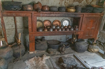 Pictures from Balti Heritage Home and Museum, display the village home, century-old utensils, horse saddle, and vibrant clothing of the Ladakhi people. The old mud house was constructed 140 years ago.