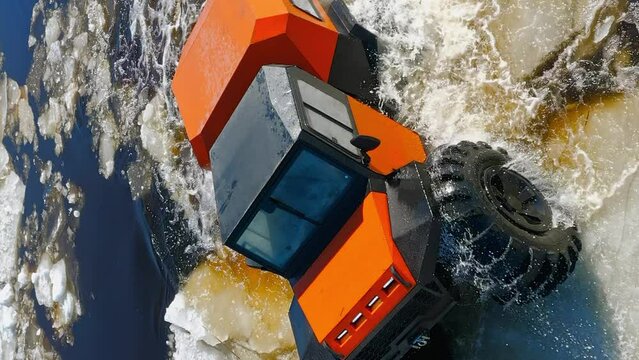 The car is falling through the ice. Tundra Tackling Titan. Roaring Across the Winter Realm. Vertical 9x16 Aerial Drone shot