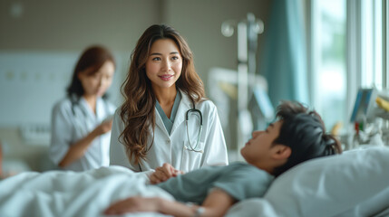 Female doctor and young male patient who lie on the bed while checking pulse, consult and explain with nurse taking note and supporting in hospital wards.