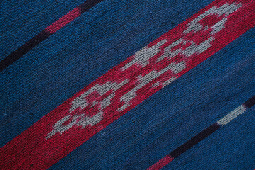 diagonal strip texture and tribal pattern on woven fabric