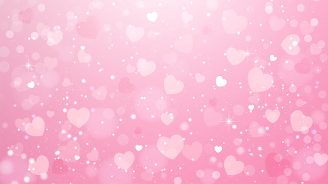 Valentine s day background with heart shaped bokeh. Defocused pink background with heart shape bokeh lights.
