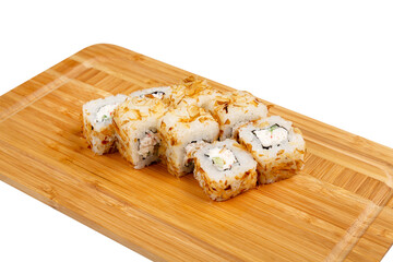Japanese sushi roll on a wooden board, isolated.