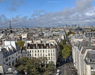 Fototapeta premium Cityscape of Paris, France, with Eiffel Tower in the background