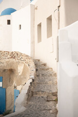 Stone staircase along the buildings on the island of Santorini