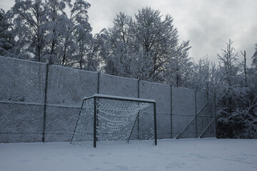football goal covered in snow in winter