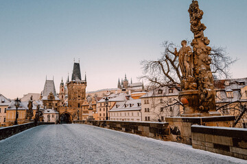 Snowy Charles Bridge in Prague in winter, no people, morning