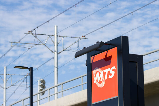 San Diego, CA, USA - May 14, 2022: MTS sign is seen outside a public transit station at UC San Diego operated by the San Diego Metropolitan Transit System (MTS).