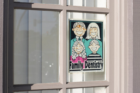 Chula Vista, CA, USA - May 14, 2022: Family Dentistry sign is seen at the entrance to a dentist's office in Chula Vista, California.