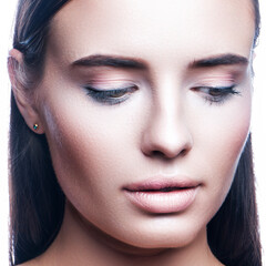 Beauty young model woman with natural nude make-up, perfect clean skin looking away. Beauty treatment concept