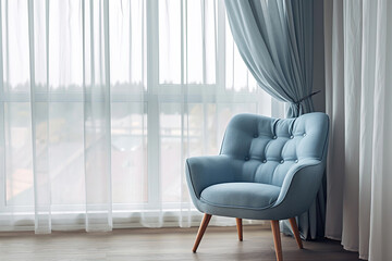 soft blue chair near the window in living room