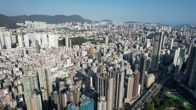 Drone Aerial Skyview in Sham Shui Po, a busy street with crowded people and old densely residential and commercial downtown district located in Kowloon Hong Kong, between Cheung Sha Wan Prince Edward 