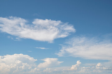 The sky is bright day, the clouds look beautiful.