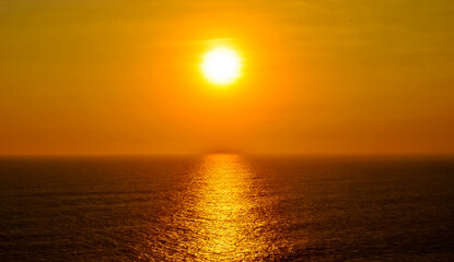 Fototapeta premium View of Kuta Beach, Bali with a beautiful sunset in the background