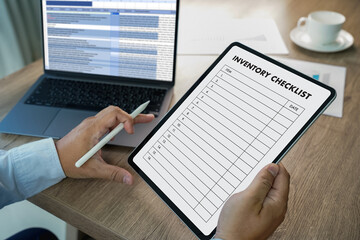 Fototapeta na wymiar inventory list checks on on the tablet online checklist and checking stock