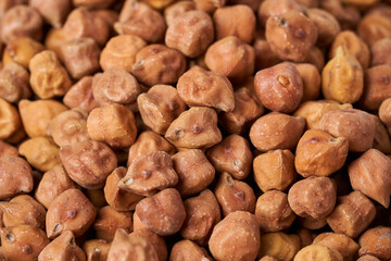 close up pile of raw black chickpea chick pea legume kala chana food background