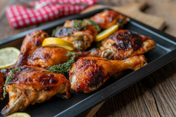 Baked chicken thighs and drumsticks with honey barbecue sauce