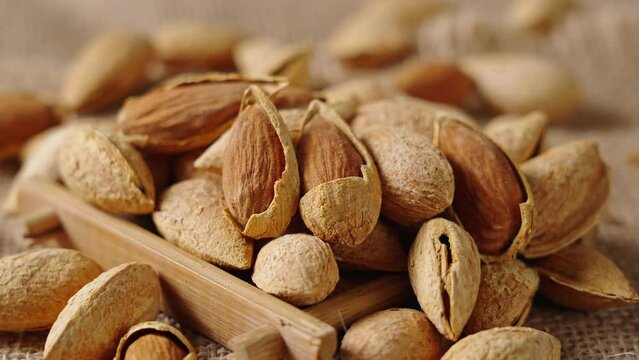 Closeup of almonds，organic badam on table.