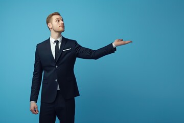 Confident Businessman Pointing, Directing Attention Professionally.